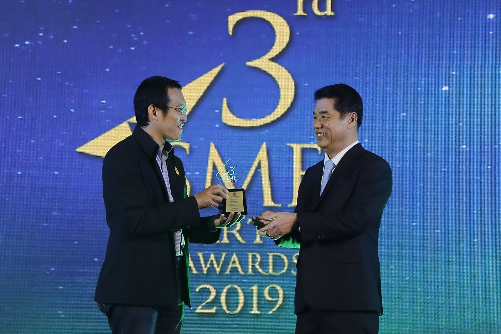 Ereky representative receiving the SME Start-Up Award in 2019